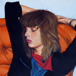 The Girl in the Orange Chair